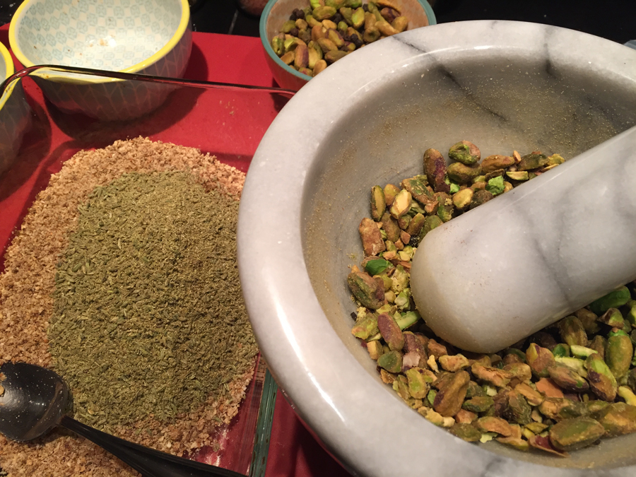 Grinding the ingredients individually with a mortar and pestle