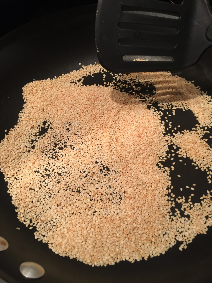 Dry pan toasting of the sesame seeds